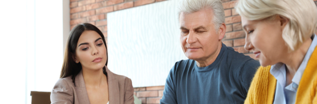 Older couple filing bankruptcy paperwork with a Licensed Insolvency Trustee